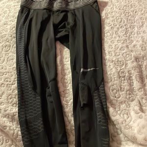 Nike leggings has a small hole under nike sign